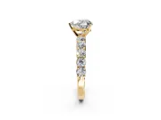 Shared-Prong Engagement Ring Setting for Heart-Shaped Center with Graduated Accents and Prong Head in Yellow Gold