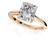 Solitaire Engagement Ring Setting for Radiant Cut Center with Narrow Cathedral Band and Prong Head in Rose Gold