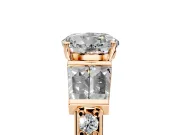 Channel-Set Engagement Ring Setting for Round Cut Center with Baguette Band and Prong Head in Rose Gold
