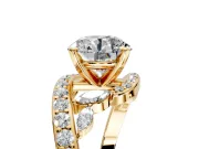 Solitaire Engagement Ring Setting for Round Cut Center with Pave Bypass Twist Band and Prong Head in Yellow Gold