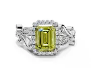 Halo Engagement Ring Setting for Fancy Yellow Emerald Cut Center with Leaf Motif Split Shank and Prong Head in Platinum