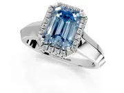 Halo Engagement Ring Setting for Fancy Blue Emerald Cut Center with Knife Ridge Cathedral Band and Prong Head in White Gold