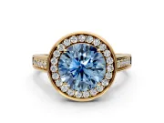 Halo Engagement Ring Setting for Fancy Blue Round Cut Center with Outer Bezel Rim, Pave Band and Prong Head in Yellow Gold
