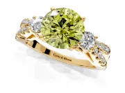 3 Stone Engagement Ring Setting for Fancy Yellow Round Cut Center with Pave Split Shank and Prong Head in Yellow Gold