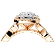 Halo Engagement Ring Setting for Radiant Cut Center with Pave and Plain Twist Band and Prong Head in Rose Gold