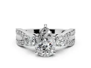 3 Stone Engagement Ring Setting for Pear-Shaped Center with Pave Twist Band and Prong Head in Sterling Silver