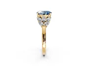 Leaf Cluster Engagement Ring Setting for Fancy Blue Oval Center with Marquise Accents and Prong Head in Yellow Gold