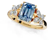 Floral Engagement Ring Setting for Fancy Blue Emerald Cut Center with Marquise Cluster Shoulders and Prong Head in Yellow Gold