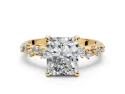 Solitaire Engagement Ring Setting for Radiant Cut Center with Trailing Leaf Accent Band and Prong Head in Yellow Gold