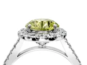 Halo Engagement Ring Setting for Fancy Yellow Round Cut Center with Narrowing Pave Band and Prong Head in Sterling Silver