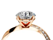 Side Accent Engagement Ring Setting for Round Cut Center with Accent Shoulders and Prong Head in Rose Gold
