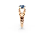 Halo Engagement Ring Setting for Fancy Blue Round Cut Center with Rope Twist Split Shank and Prong Head in Rose Gold