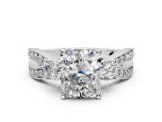 3 Stone Engagement Ring Setting for Radiant Cut Center with Pave Twist Band and Prong Head in White Gold