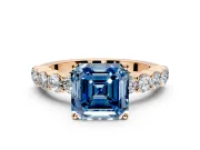 Shared-Prong Engagement Ring Setting for Fancy Blue Asscher Cut Center with Graduated Accents and Prong Head in Rose Gold