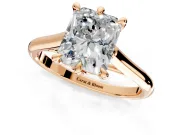 Solitaire Engagement Ring Setting for Radiant Cut Center with Cathedral Band and Prong Head in Rose Gold