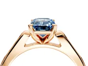 Solitaire Engagement Ring Setting for Fancy Blue Emerald Cut Center with Channel Accents and Prong Head in Rose Gold