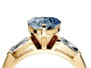 3 Stone Engagement Ring Setting for Fancy Blue Heart-Shaped Center with Tapered Baguettes, Plain Band and Prong Head in Yellow Gold
