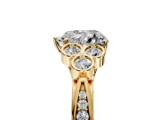 Cluster Engagement Ring Setting for Heart-Shaped Center with Bezel Accent Clusters and Prong Head in Yellow Gold