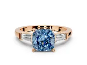 3 Stone Engagement Ring Setting for Fancy Blue Cushion Cut Center with Channel Baguette Accents and Prong Head in Rose Gold