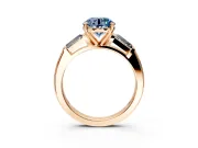 3 Stone Engagement Ring Setting for Fancy Blue Round Cut Center with Tapered Baguettes, Plain Band and Prong Head in Rose Gold