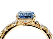 Cluster Engagement Ring Setting for Fancy Blue Radiant Cut Center with Round Cut Accent Band and Prong Head in Yellow Gold