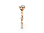 Solitaire Engagement Ring Setting for Heart-Shaped Center with Beaded Bezel Station Band and Prong Head in Rose Gold
