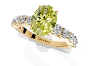 Shared-Prong Engagement Ring Setting for Fancy Yellow Oval Center with Graduated Accents and Prong Head in Yellow Gold