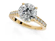 Solitaire Engagement Ring Setting for Round Cut Center with Crossover Accents and Prong Head in Yellow Gold