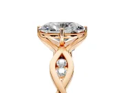 Solitaire Engagement Ring Setting for Oval Center with Accented Twist Band and Leaf Prong Head in Rose Gold
