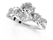 3 Stone Engagement Ring Setting for Oval Center with Pave Split Shank and Prong Head in Platinum