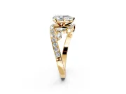 Solitaire Engagement Ring Setting for Pear-Shaped Center with Pave Bypass Twist Band and Prong Head in Yellow Gold