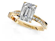 Side Accent Engagement Ring Setting for Emerald Cut Center with Accent Shoulders and Prong Head in Yellow Gold