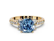 Paired Accent Engagement Ring Setting for Fancy Blue Cushion Cut Center with Pave Band and Prong Head in Yellow Gold