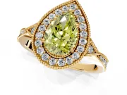 Halo Engagement Ring Setting for Fancy Yellow Pear-Shaped Center with Milgrain Rim, Pave Band and Prong Head in Yellow Gold