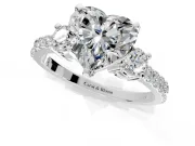 3 Stone Engagement Ring Setting for Heart-Shaped Center with Round Cut Side Accents and Prong Head in Platinum