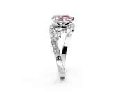 Solitaire Engagement Ring Setting for Fancy Pink Pear-Shaped Center with Pave Bypass Twist Band and Prong Head in Platinum
