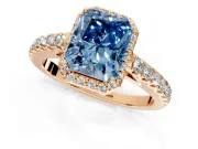 Halo Engagement Ring Setting for Fancy Blue Radiant Cut Center with Full Pave Band and Prong Head in Rose Gold