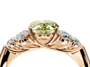 Cluster Engagement Ring Setting for Fancy Yellow Oval Center with Round Cut Accent Frame and Prong Head in Rose Gold