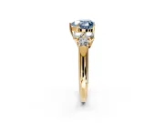 Cluster Engagement Ring Setting for Fancy Blue Heart-Shaped Center with Round Cut Accent Frame and Prong Head in Yellow Gold