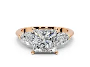 3 Stone Engagement Ring Setting for Princess Cut Center with Large Pear-Shaped Accents and Prong Head in Rose Gold