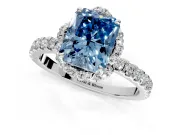 Halo Engagement Ring Setting for Fancy Blue Radiant Cut Center with Openwork Halo, Pave Band and Prong Head in Platinum