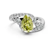 Solitaire Engagement Ring Setting for Fancy Yellow Pear-Shaped Center with Pave Bypass Twist Band and Prong Head in Platinum