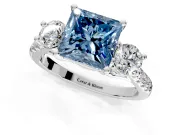 3 Stone Engagement Ring Setting for Fancy Blue Princess Cut Center with Crossover Basket, Pave Band and Prong Head in Platinum