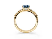 Cluster Engagement Ring Setting for Fancy Blue Radiant Cut Center with Round Cut Accent Band and Prong Head in Yellow Gold