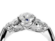 Cluster Engagement Ring Setting for Pear-Shaped Center with Round Cut Accent Frame and Prong Head in White Gold