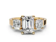 3 Stone Engagement Ring Setting for Emerald Cut Center with Matching Side Accents and Prong Head in Yellow Gold