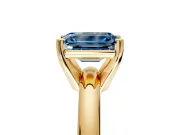 Solitaire Engagement Ring Setting for Fancy Blue Emerald Cut Center with Wire Band and Prong Head in Yellow Gold