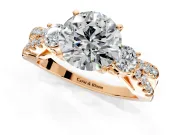 3 Stone Engagement Ring Setting for Round Cut Center with Pave Split Shank and Prong Head in Rose Gold