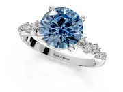 Solitaire Engagement Ring Setting for Fancy Blue Round Cut Center with Trailing Leaf Accent Band and Prong Head in Sterling Silver