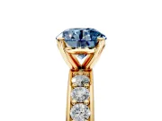 Solitaire Engagement Ring Setting for Fancy Blue Round Cut Center with Channel-Set Accents and Prong Head in Yellow Gold